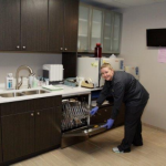 Dental Tech Desfifecting Dental Utelsils - Dr. Seibert's Office