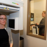 Tech Performing Dental X-Rays to a Patient - Dr. Seibert's office